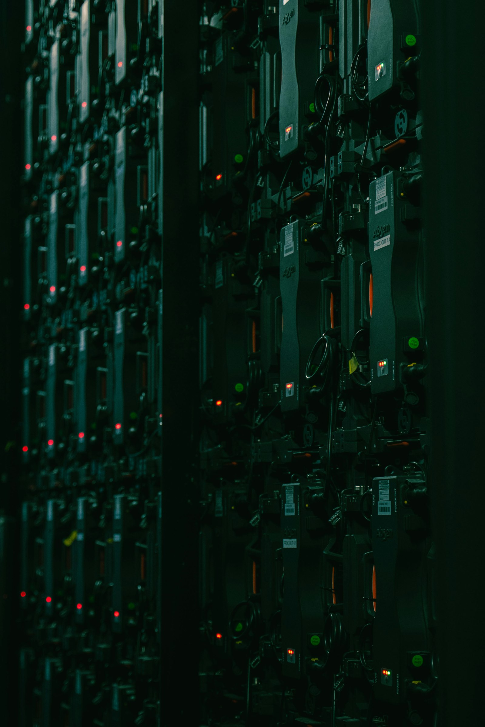 High-density server rack with green LED indicators
